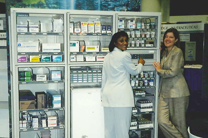 Vintage photo of our associates demonstrating an early version of Nucleus