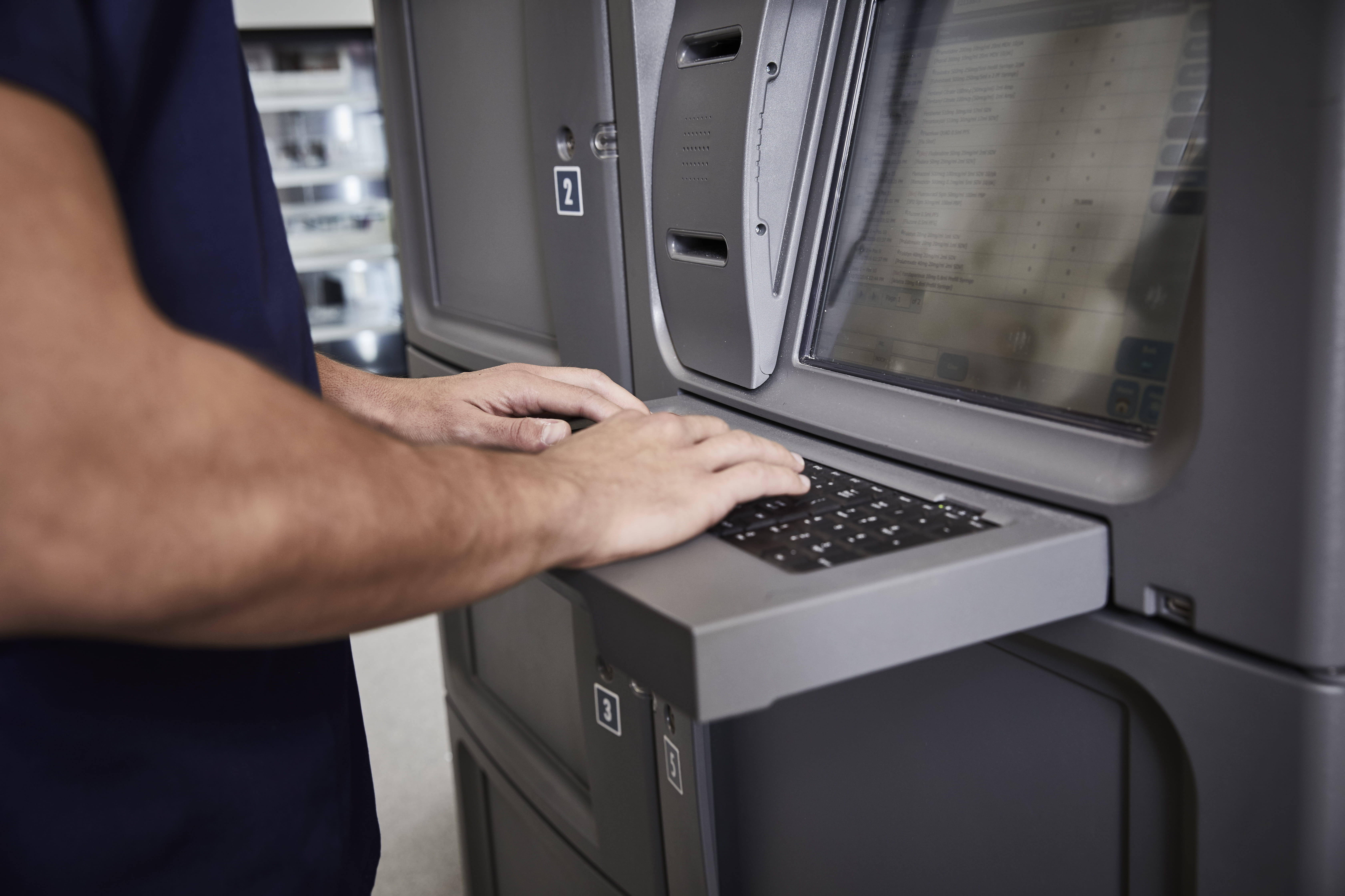 A technician typing at the Nucleus keyboard